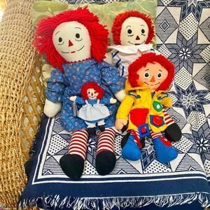 Cute collection of 4 Raggedy Ann dolls